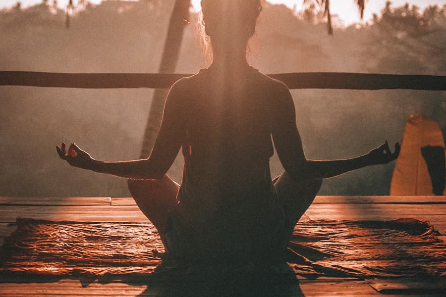 Participants performing yoga together during an International Yoga Day public session in India.
